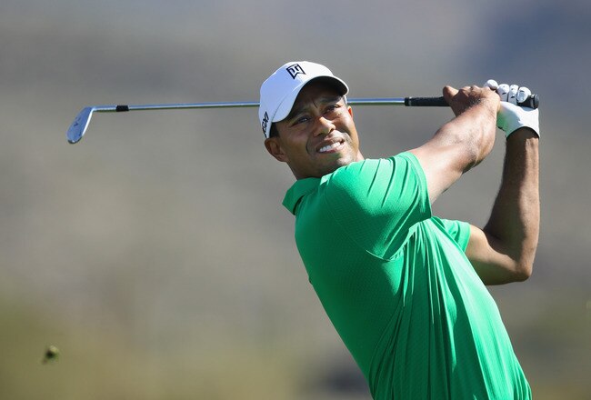 MARANA, AZ - FEBRUARY 22:  Tiger Woods hits a shot on the second hole during the first round of the World Golf Championships-Accenture Match Play Championship at the Ritz-Carlton Golf Club on February 22, 2012 in Marana, Arizona.  (Photo by Christian Petersen/Getty Images)