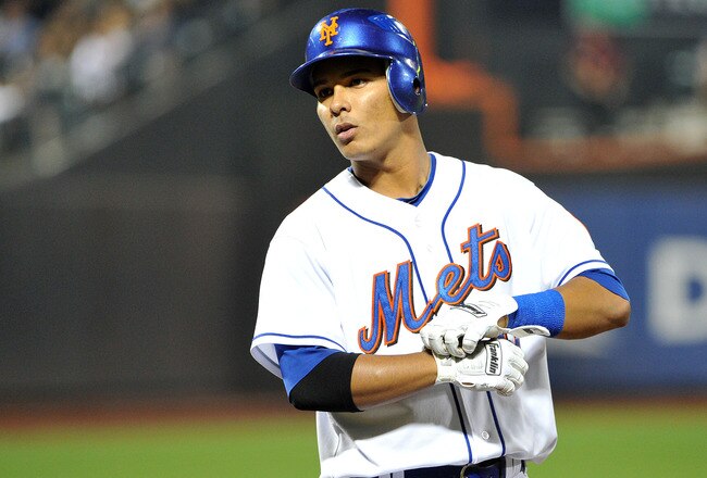 NEW YORK, NY - SEPTEMBER 14: Ruben Tejada #11 of the New York Mets reacts after grounding out to end the bottom of the seventh inning against the Washington Nationals at Citi Field on September 14, 2011 in the Flushing neighborhood of the Queens borough of New York City. (Photo by Christopher Pasatieri/Getty Images)