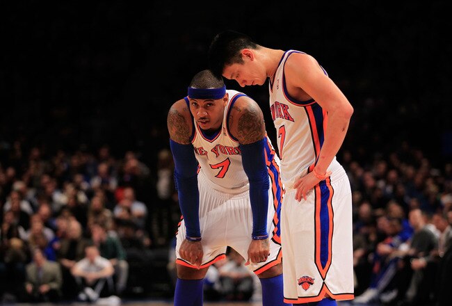 NEW YORK, NY - FEBRUARY 20: Carmelo Anthony #7 and Jeremy Lin #17 of the New York Knicks stand on the court against the New Jersey Nets at Madison Square Garden on February 20, 2012 in New York City. NOTE TO USER: User expressly acknowledges and agrees that, by downloading and/or using this Photograph, user is consenting to the terms and conditions of the Getty Images License Agreement.  (Photo by Chris Trotman/Getty Images)