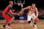 NEW YORK, NY - FEBRUARY 20: Jeremy Lin #17 of the New York Knicks drives against Sundiata Gaines #1 of the New Jersey Nets at Madison Square Garden on February 20, 2012 in New York City. NOTE TO USER: User expressly acknowledges and agrees that, by downloading and/or using this Photograph, user is consenting to the terms and conditions of the Getty Images License Agreement.  (Photo by Chris Trotman/Getty Images)