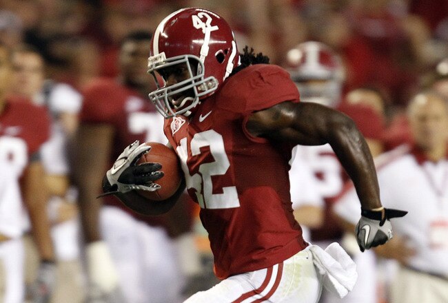 TUSCALOOSA, AL - SEPTEMBER 17:  Running back Eddie Lacy #42 of the Alabama Crimson Tide breaks away for a touchdown against the North Texas Mean Green on September 17, 2011 at Bryant-Denny Stadium in Tuscaloosa, Alabama. (Photo by Butch Dill/Getty Images)