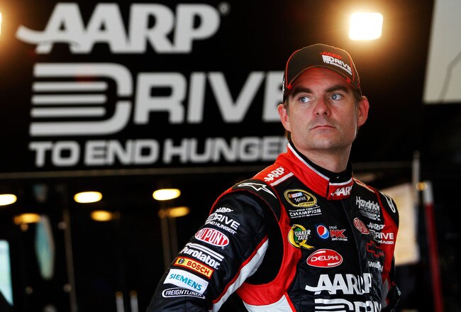 DAYTONA BEACH, FL - FEBRUARY 22:  Jeff Gordon, driver of the #24 Drive to End Hunger Chevrolet, looks on in the garage during practice for the NASCAR Sprint Cup Series Daytona 500 at Daytona International Speedway on February 22, 2012 in Daytona Beach, Florida.  (Photo by Tom Pennington/Getty Images for NASCAR)