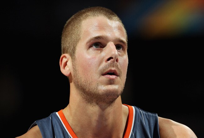 DENVER, CO - MARCH 02:  Joel Pryzbilla #10 of the Charlotte Bobcats takes a free throw against the Denver Nuggets at the Pepsi Center on March 2, 2011 in Denver, Colorado. The Nuggets defeated the Bobcats 120-80.NOTE TO USER: User expressly acknowledges and agrees that, by downloading and or using this photograph, User is consenting to the terms and conditions of the Getty Images License Agreement.  (Photo by Doug Pensinger/Getty Images)