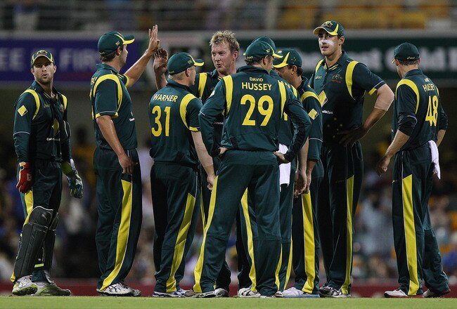 BRISBANE, AUSTRALIA - FEBRUARY 19:  Brett Lee celebrates with team mates afetr taking the wicket of Vinay Kumar of India during game seven of the One Day International series between Australia and India at The Gabba on February 19, 2012 in Brisbane, Australia.  (Photo by Chris Hyde/Getty Images)