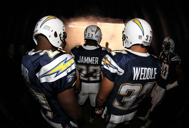 SAN DIEGO, CA - NOVEMBER 10: Quentin Jammer #23, Paul Oliver #27 and Eric Weddle #32 of the San Diego Chargers wait to enter the field during introductions before taking on the Oakland Raiders at Qualcomm Stadium on November 10, 2011 in San Diego, California. (Photo by Stephen Dunn/Getty Images)