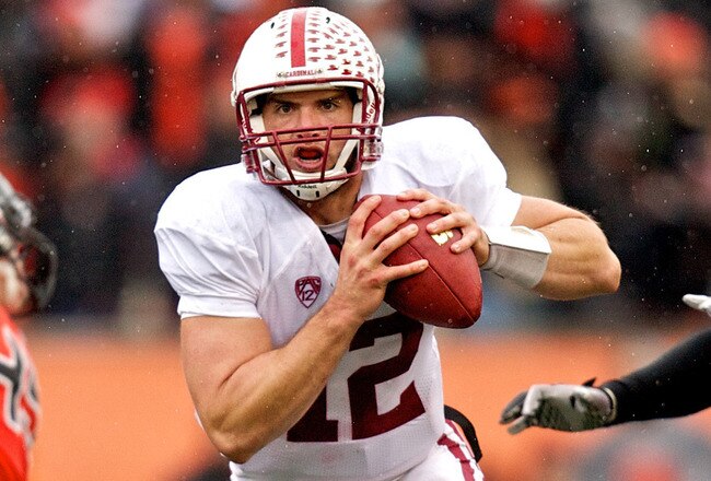 CORVALLIS, OR - NOVEMBER 5: Quarterback Andrew Luck #12 of the Stanford Cardinal rushes past defensive tackle Andrew Seumalo #49 of the Oregon State Beavers on November 5, 2011 at Reser Stadium in Corvallis, Oregon. Stanford won the game 38-13. (Photo by Craig Mitchelldyer/Getty Images)