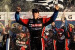 DAYTONA BEACH, FL - FEBRUARY 20:  Trevor Bayne, driver of the #21 Motorcraft/Quick Lane Ford, celebrates in Victory Lane after winning the NASCAR Sprint Cup Series Daytona 500 at Daytona International Speedway on February 20, 2011 in Daytona Beach, Florida.  (Photo by Matthew Stockman/Getty Images for NASCAR)