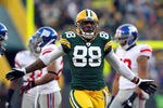 GREEN BAY, WI - JANUARY 15:  Jermichael Finley #88 of the Green Bay Packers reacts after a play against the New York Giants during their NFC Divisional playoff game at Lambeau Field on January 15, 2012 in Green Bay, Wisconsin.  (Photo by Jamie Squire/Getty Images)