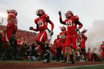SALT LAKE CITY, UT - NOVEMBER 22:  DeVonte Christopher #15 and Greg Bird #49 of the Utah Utes run onto the field before the game against the BYU Cougars at Rice-Eccles Stadium on November 22, 2008 in Salt Lake City, Utah. (Photo by Jonathan Ferrey/Getty Images)