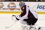 BOSTON, MA - OCTOBER 10:  Semyon Varlamov #1 of the Colorado Avalanche clears the puck against the Boston Bruins on October 10, 2011 at TD Garden in Boston, Massachusetts.  (Photo by Elsa/Getty Images)