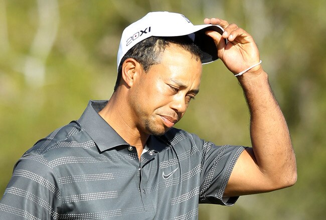 MARANA, AZ - FEBRUARY 23:  Tiger Woods reacts after losing his match to Nick Watney (not pictured) on the 18th hole during the second round of the World Golf Championships-Accenture Match Play Championship at the Ritz-Carlton Golf Club  on February 23, 2012 in Marana, Arizona.  (Photo by Christian Petersen/Getty Images)
