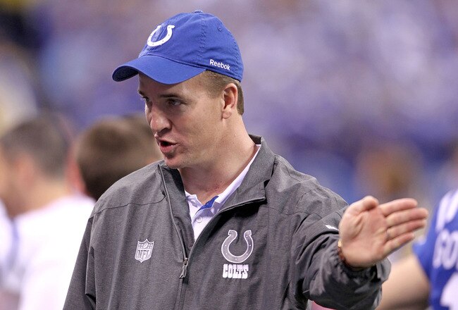 INDIANAPOLIS, IN - DECEMBER 22:  Peyton Manning  #18 of the Indianapolis Colts gives instructions to his teammates during the NFL against  the Houston Texans at Lucas Oil Stadium on December 22, 2011 in Indianapolis, Indiana.  (Photo by Andy Lyons/Getty Images)