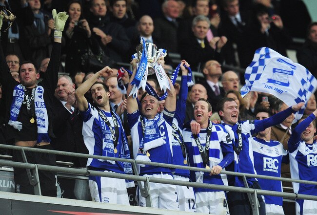 LONDON, ENGLAND - FEBRUARY 27:  Stephen Carr of Birmingham City lifts the trophy after victory during the Carling Cup Final between Arsenal and Birmingham City at Wembley Stadium on February 27, 2011 in London, England.  (Photo by Shaun Botterill/Getty Images)