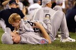 NEW YORK - JULY 14: Ryan Dempster of the Chicago Cubs with son on the field during the 2008 MLB All-Star State Farm Home Run Derby at Yankee Stadium on July 14, 2008 in the Bronx borough of New York City.  (Photo by Jim McIsaac/Getty Images)