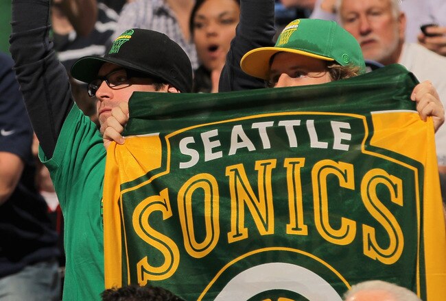 DENVER, CO - APRIL 23:  Seattle Sonics fans display signs as the support the Denver Nuggets against the Oklahoma City Thunder in Game Three of the Western Conference Quarterfinals in the 2011 NBA Playoffs on April 23, 2011 at the Pepsi Center in Denver, Colorado. NOTE TO USER: User expressly acknowledges and agrees that, by downloading and or using this photograph, User is consenting to the terms and conditions of the Getty Images License Agreement.  (Photo by Doug Pensinger/Getty Images)