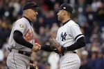 29 Sep 2001: Cal Ripken Jr. of the Baltimore Orioles shakes hands with Derek Jeter of the New York Yankees before  the game at Yankee Stadium in the Bronx, New York. DIGITAL IMAGE. Mandatory Credit: Ezra Shaw/Allsport
