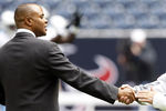 HOUSTON - NOVEMBER 28:  Rick Smith, general manager of the Houston Texans, left, talks with head coach Jeff Fisher before a football game at Reliant Stadium on November 28, 2010 in Houston, Texas.  (Photo by Bob Levey/Getty Images)
