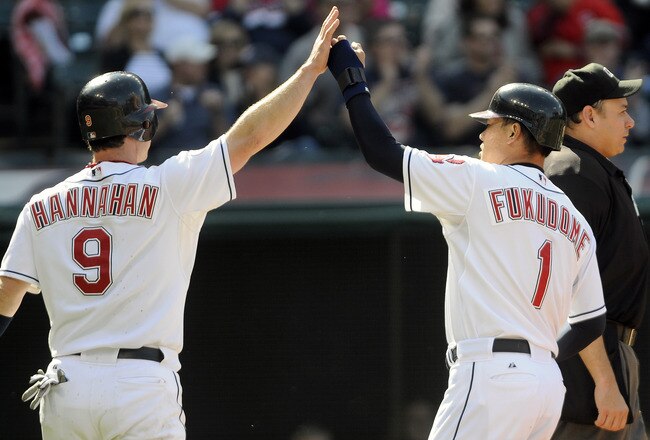 CLEVELAND, OH - SEPTEMBER 24: Jack Hannahan #9 and Kosuke Fukudome #1 celebrate after scoring on a single hit by Jason Kipnis #22 of the Cleveland Indians during the sixth inning against the Minnesota Twins at Progressive Field on September 24, 2011 in Cleveland, Ohio. (Photo by Jason Miller/Getty Images)