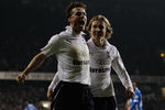 LONDON, ENGLAND - JANUARY 31:  Luka Modric of Spurs celebrates scoring their second goal with Scott Parker of Spurs during the Barclays Premier League match between Tottenham Hotspur and Wigan Athletic at White Hart Lane on January 31, 2012 in London, England.  (Photo by Paul Gilham/Getty Images)