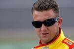 DAYTONA BEACH, FL - FEBRUARY 19:  A.J. Allmendinger, driver of the #22 Shell/Pennzoil Dodge, looks on during qualifying for the NASCAR Sprint Cup Series Daytona 500 at Daytona International Speedway on February 19, 2012 in Daytona Beach, Florida.  (Photo by Todd Warshaw/Getty Images for NASCAR)