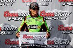 DAYTONA BEACH, FL - FEBRUARY 24:  Danica Patrick, driver of the #7 GoDaddy.com Chevrolet, poses with the Coors Light Pole Award after qualifying fot the pole position for the NASCAR Nationwide Series DRIVE4COPD 300 at Daytona International Speedway on February 24, 2012 in Daytona Beach, Florida.  (Photo by Tom Pennington/Getty Images for NASCAR)