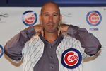 CHICAGO, IL - NOVEMBER 18:  Dale Sveum, the new manager of the Chicago Cubs, tries on a jersey during a press conference at Wrigley Field on November 18, 2011 in Chicago, Illinois.  (Photo by Jonathan Daniel/Getty Images)