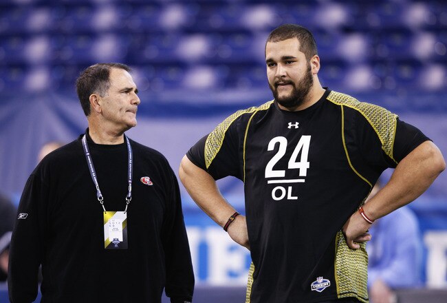 INDIANAPOLIS, IN - FEBRUARY 25: Offensive lineman Matt Kalil of USC talks with San Francisco 49ers offensive line coach Mike Solari during the 2012 NFL Combine at Lucas Oil Stadium on February 25, 2012 in Indianapolis, Indiana. (Photo by Joe Robbins/Getty Images)