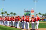 CLEARWATER, FL - FEBRUARY 27:  Players of the Philadelphia Phillies and the New York Yankees line up for pre-game introductions February 27, 2011 at Bright House Field in Clearwater, Florida.  (Photo by Al Messerschmidt/Getty Images)