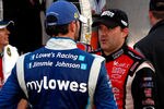 MARTINSVILLE, VA - OCTOBER 30:  Tony Stewart, driver of the #14 Office Depot/Mobil 1 Chevrolet, talks with Jimmie Johnson, driver of the #48 MyLowe's Chevrolet in victory lane after the NASCAR Sprint Cup Series TUMS Fast Relief 500 at Martinsville Speedway on October 30, 2011 in Martinsville, Virginia.  (Photo by Jeff Zelevansky/Getty Images for NASCAR)