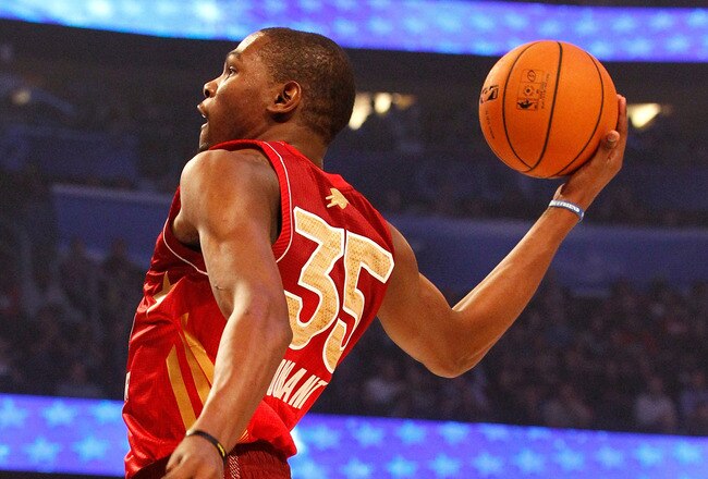 ORLANDO, FL - FEBRUARY 26:  Kevin Durant #35 of the Oklahoma City Thunder and the Western Conference dunks during the 2012 NBA All-Star Game at the Amway Center on February 26, 2012 in Orlando, Florida.  NOTE TO USER: User expressly acknowledges and agrees that, by downloading and or using this photograph, User is consenting to the terms and conditions of the Getty Images License Agreement.  (Photo by Ronald Martinez/Getty Images)