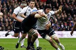 EDINBURGH, SCOTLAND - FEBRUARY 26:  Ross Rennie of Scotland is tackled during the RBS Six Nations match between Scotland and France at Murrayfield Stadium on February 26, 2012 in Edinburgh, Scotland.  (Photo by David Rogers/Getty Images)