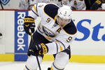 PITTSBURGH, PA - DECEMBER 17:  Derek Roy #9 of the Buffalo Sabres handles the puck against the Pittsburgh Penguins during the game at Consol Energy Center on December 17, 2011 in Pittsburgh, Pennsylvania.  (Photo by Justin K. Aller/Getty Images)