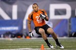 INDIANAPOLIS, IN - FEBRUARY 26: Running back Chris Polk of Washington runs through a drill during the 2012 NFL Combine at Lucas Oil Stadium on February 26, 2012 in Indianapolis, Indiana. (Photo by Joe Robbins/Getty Images)