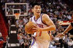 MIAMI, FL - FEBRUARY 23: Jeremy Lin #17 of the New York Knicks drives during a game against the Miami Heat at American Airlines Arena on February 23, 2012 in Miami, Florida. NOTE TO USER: User expressly acknowledges and agrees that, by downloading and/or using this Photograph, User is consenting to the terms and conditions of the Getty Images License Agreement.  (Photo by Mike Ehrmann/Getty Images)