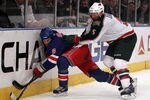 NEW YORK, NY - MARCH 03: Brandon Prust #8 of the New York Rangers is checked by Greg Zanon #5 of the Minnesota Wild at Madison Square Garden on March 3, 2011 in New York City.  (Photo by Nick Laham/Getty Images)