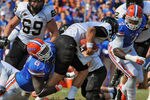 GAINESVILLE, FL -  NOVEMBER 5:  Defensive tackle Jaye Howard #6 of the Florida Gators sacks quarterback Jordan Rodgers #11 of the Vanderbilt Commodores November 5, 2011 at Ben Hill Griffin Stadium in Gainesville, Florida.  (Photo by Al Messerschmidt/Getty Images)