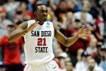 ANAHEIM, CA - MARCH 24:  Jamaal Franklin #21 of the San Diego State Aztecs reacts after a play against the Connecticut Huskies during the west regional semifinal of the 2011 NCAA men's basketball tournament at the Honda Center on March 24, 2011 in Anaheim, California.  (Photo by Kevork Djansezian/Getty Images)