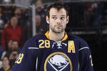 BUFFALO, NY - NOVEMBER 8:  Paul Gaustad #28 of the Buffalo Sabres prepares to play against the Winnipeg Jets during their NHL game at First Niagara Center November 8, 2011 in Buffalo, New York.  (Photo by Dave Sandford/Getty Images)