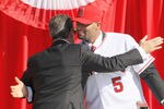 ANAHEIM, CA - DECEMBER 10:  Albert Pujols (R) embraces Angels owner Arturo Moreno at a public press conference introducing newly signed Los Angeles Angels of Anaheim  players Pujols and C.J. Wilson at Angel Stadium on December 10, 2011 in Anaheim, California.  (Photo by Stephen Dunn/Getty Images)