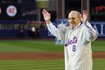 NEW YORK - SEPTEMBER 28:  Former Mets manager Yogi Berra greets fans from the field in a post game ceremony after the last regular season baseball game ever played in Shea Stadium against the Florida Marlins on September 28, 2008 in the Flushing neighborhood of the Queens borough of New York City. The Mets plan to start next season at their new stadium Citi Field after playing in Shea for over 44 years.  (Photo by Jim McIsaac/Getty Images)