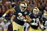 ORLANDO, FL - DECEMBER 29: Wide receiver Michael Floyd #3 of the Notre Dame Fight Irish runs upfield against the Florida State Seminoles in the Champs Sports Bowl December 29, 2011 at the Florida Citrus Bowl in Orlando, Florida.  FSU won 18 - 14. (Photo by Al Messerschmidt/Getty Images)