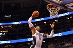 ORLANDO, FL - FEBRUARY 06:  Dwight Howard #12 of the Orlando Magic attempts a shot during the game against the Los Angeles Clippers at Amway Center on February 6, 2012 in Orlando, Florida.   NOTE TO USER: User expressly acknowledges and agrees that, by downloading and or using this Photograph, user is consenting to the terms and conditions of the Getty Images License Agreement.  (Photo by Sam Greenwood/Getty Images)