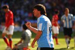 JOHANNESBURG, SOUTH AFRICA - JUNE 17:  Lionel Messi of Argentina celebrates after team mate Gonzalo Higuain scores his isde's third goal during the 2010 FIFA World Cup South Africa Group B match between Argentina and South Korea at Soccer City Stadium on June 17, 2010 in Johannesburg, South Africa.  (Photo by Clive Rose/Getty Images)