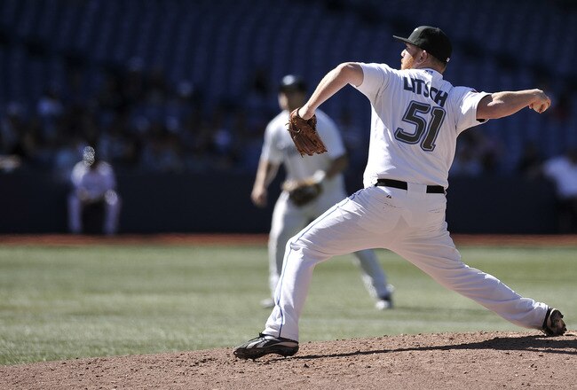 TORONTO, CANADA - SEPTEMBER 10:  Jesse Litsch #51 of the Toronto Blue Jays delivers a pitch during MLB game action against the Baltimore Orioles September 10, 2011 at Rogers Centre in Toronto, Ontario, Canada. (Photo by Brad White/Getty Images)