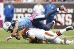 CLEVELAND, OH - OCTOBER 02:  Cornerback Cortland Finnegan #31 of the Tennessee Titans hits quarterback Colt McCoy #12 of the Cleveland Browns at Cleveland Browns Stadium on October 2, 2011 in Cleveland, Ohio.  (Photo by Matt Sullivan/Getty Images)