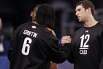 INDIANAPOLIS, IN - FEBRUARY 26: Quarterbacks Andrew Luck of Stanford and Robert Griffin III of Baylor meet during the 2012 NFL Combine at Lucas Oil Stadium on February 26, 2012 in Indianapolis, Indiana. (Photo by Joe Robbins/Getty Images)