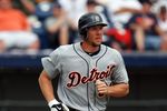 VIERA, FL - MARCH 09:  Outfielder Clete Thomas #34 of the Detroit Tigers follows his hit against the Washington Nationals at Space Coast Stadium on March 9, 2010 in Viera, Florida.  (Photo by Doug Benc/Getty Images)