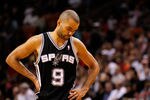 MIAMI, FL - JANUARY 17:  Tony Parker #9 of the San Antonio Spurs looks on during a game against the Miami Heat at American Airlines Arena on January 17, 2012 in Miami, Florida. NOTE TO USER: User expressly acknowledges and agrees that, by downloading and/or using this Photograph, User is consenting to the terms and conditions of the Getty Images License Agreement.  (Photo by Mike Ehrmann/Getty Images)