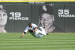 CHICAGO, IL - SEPTEMBER 11: Alex Rios #51 of the Chicago White tries to make a diving catch on Trevor Crowe #4 of the Cleveland Indians in the sixth inning on September 11, 2011 at U.S. Cellular Field in Chicago, Illinois.  (Photo by David Banks/Getty Images)