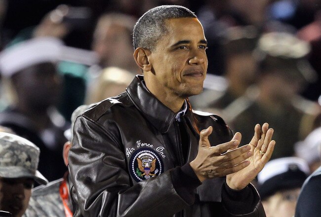 CORONADO, CA - NOVEMBER 11:  U.S. President Barack Obama claps his hands after the NCAA men's college basketball Carrier Classic between the Michigan State Spartans and the North Carolina Tar Heels aboard the flight deck of the USS Carl Vinson on November 11, 2011 in San Diego, California.  (Photo by Ezra Shaw/Getty Images)